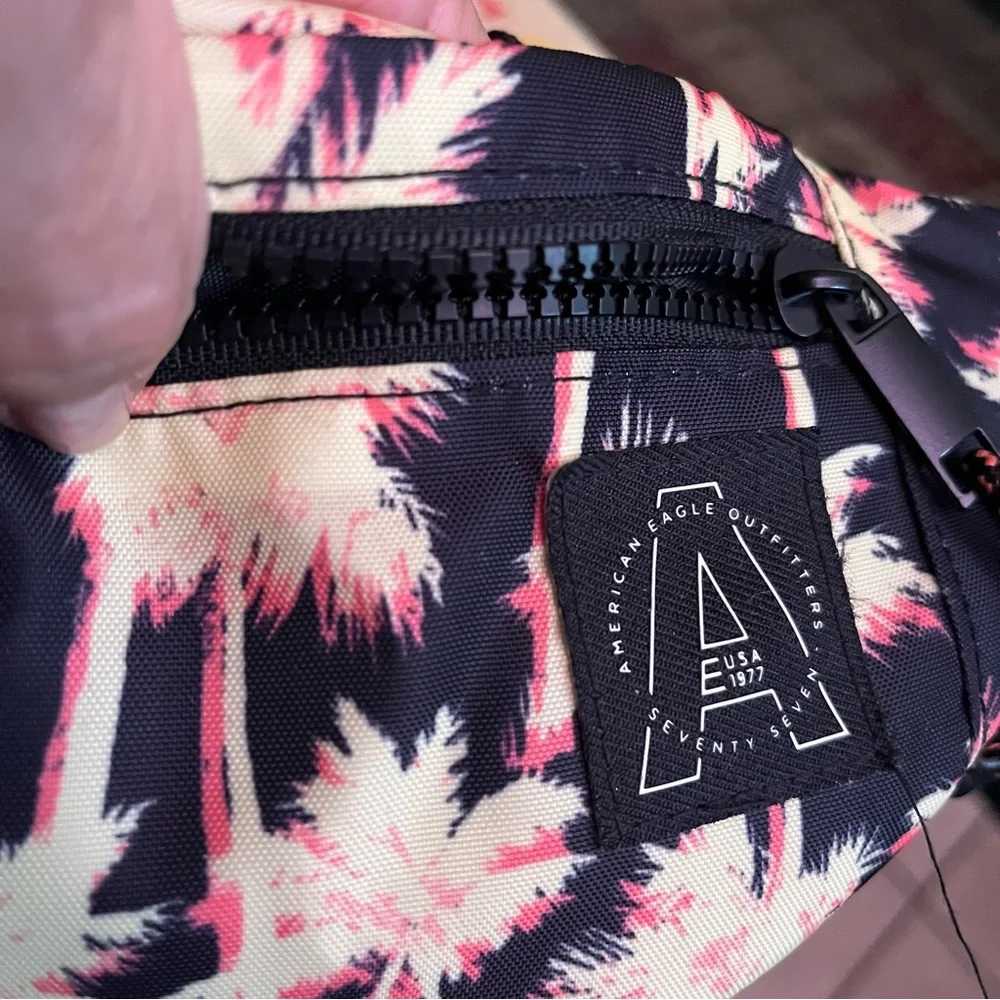 American Eagle fanny pack Three zipper pockets, palm tree design